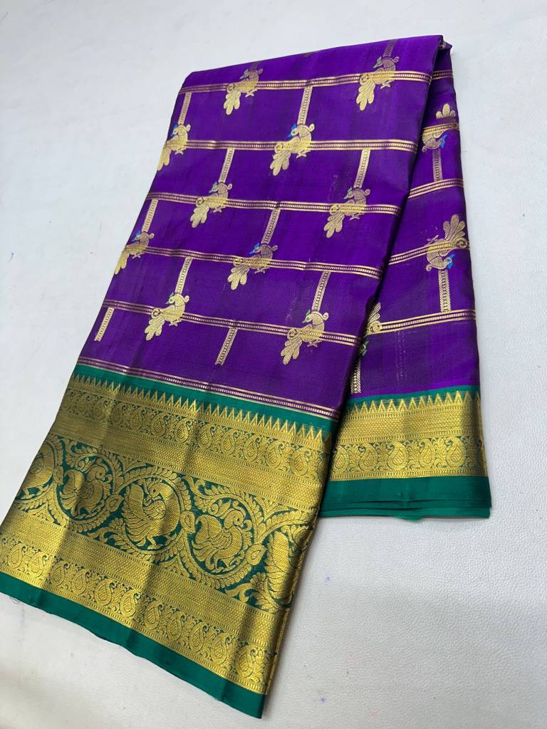 Traditional Purple Handloom Venkatagiri Pattu Saree with Bird Motifs and Rich Zari Border