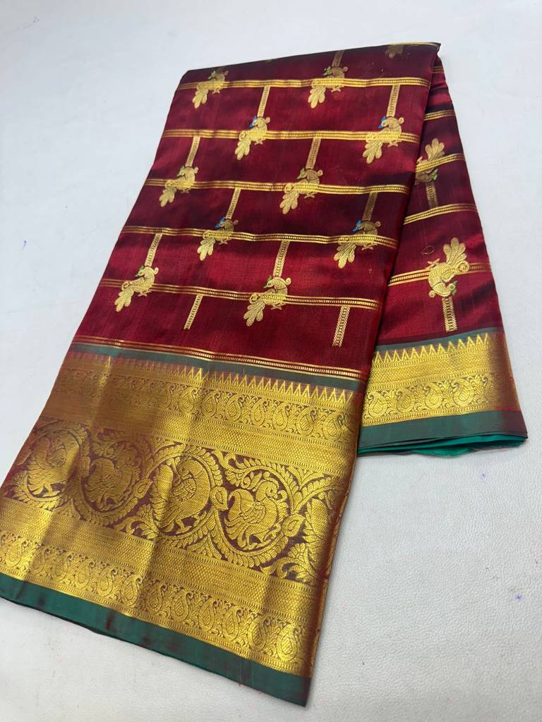 Traditional Maroon Handloom Venkatagiri Pattu Saree with Bird Motifs and Rich Zari Border