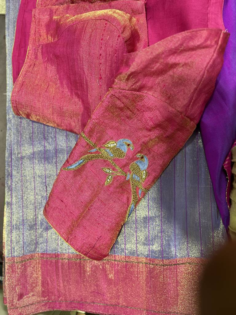 red colour tissue raw slik blouse with simple maggam work