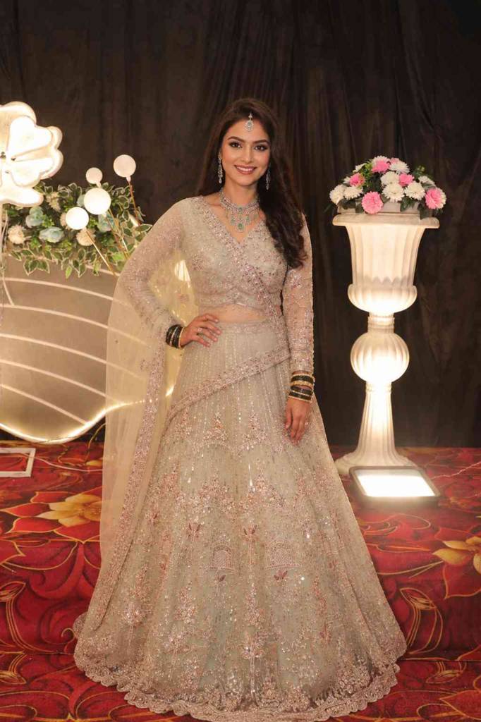 Beautiful Cream  Hand Embroidered Net Lehenga 