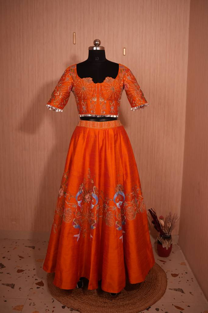 Designer Vibrant Orange Raw Silk Lehenga Choli with Hand-Employed Sea Coral & Mermaid Zari Work